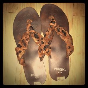 Brown flip flops